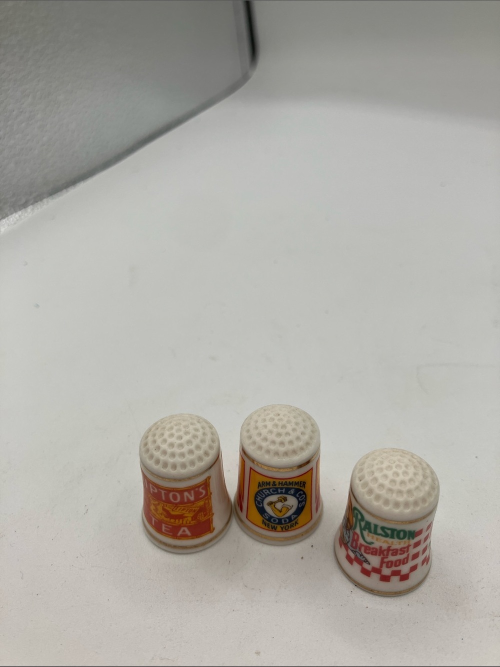 Decorative Franklin Mint  Thimbles..Lipton tea, arm and hammer, and Ralston